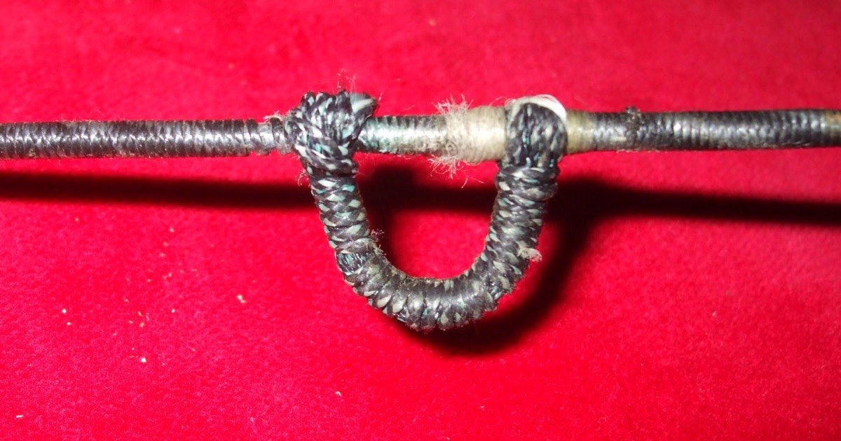 Finished D-loop of braided cord tied onto a compound bowstring