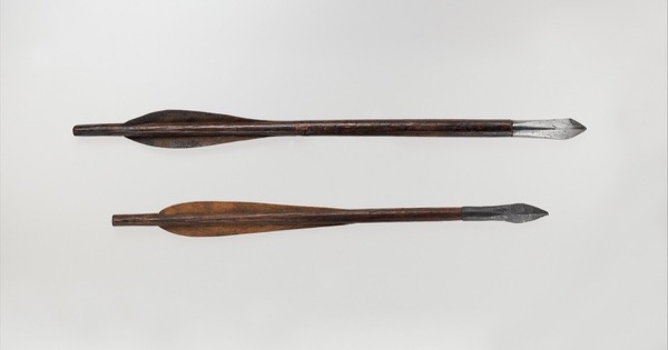 Two European crossbow bolts from the Metropolitan Museum of Art, with short wooden shafts, iron heads and two wooden flights